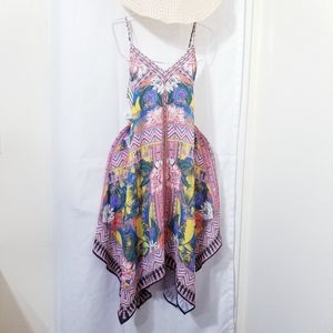 Cute asymmetrical dress, adjustable straps, cool tropical print,v neck,flowy